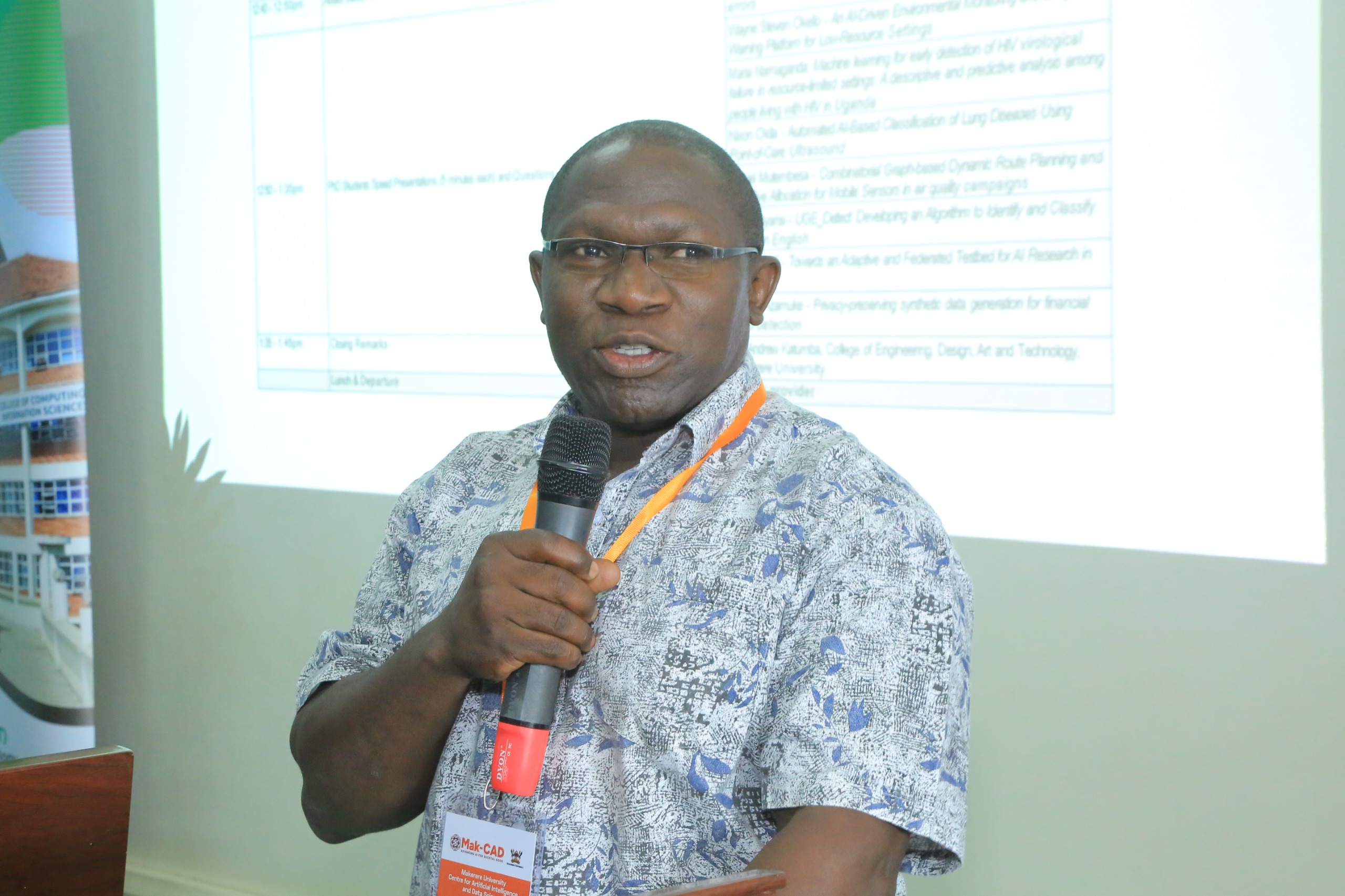 The Dean, School of Computing and Informatics Technology, Dr. Joseph Kibombo Balikuddembe delivering his remarks.